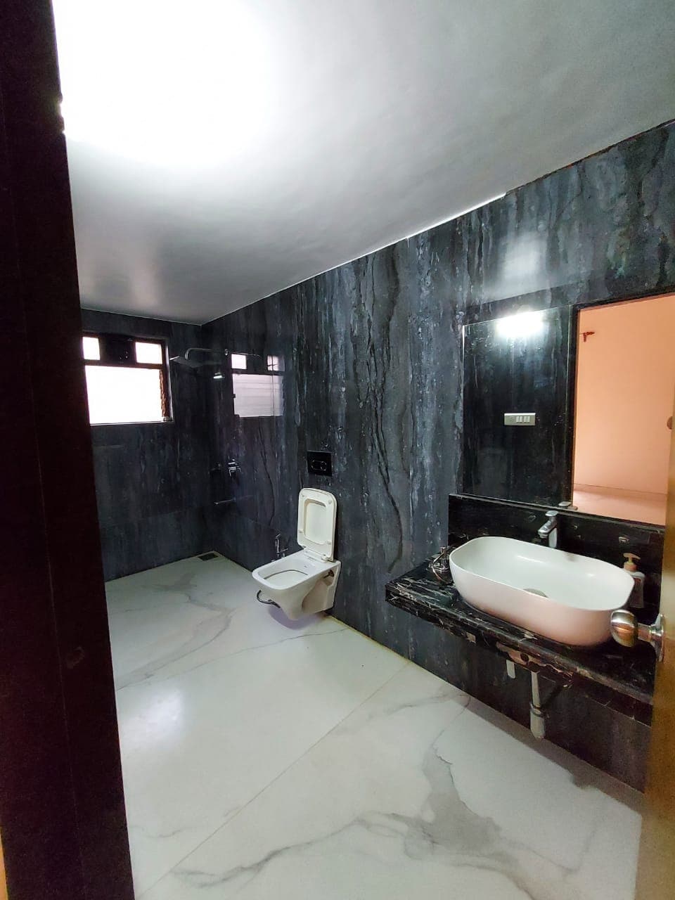 A stone-finished bathroom